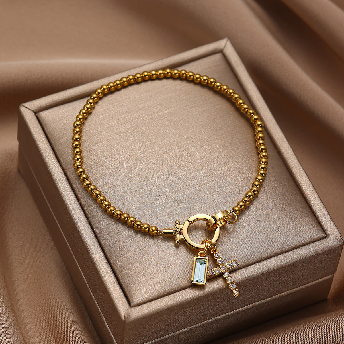 18K Vergoldetes Edelstahl-Armband mit Aquamarin & Kreuz | Damen Armkette mit Geburtsstein | Moon Stone Love Knot